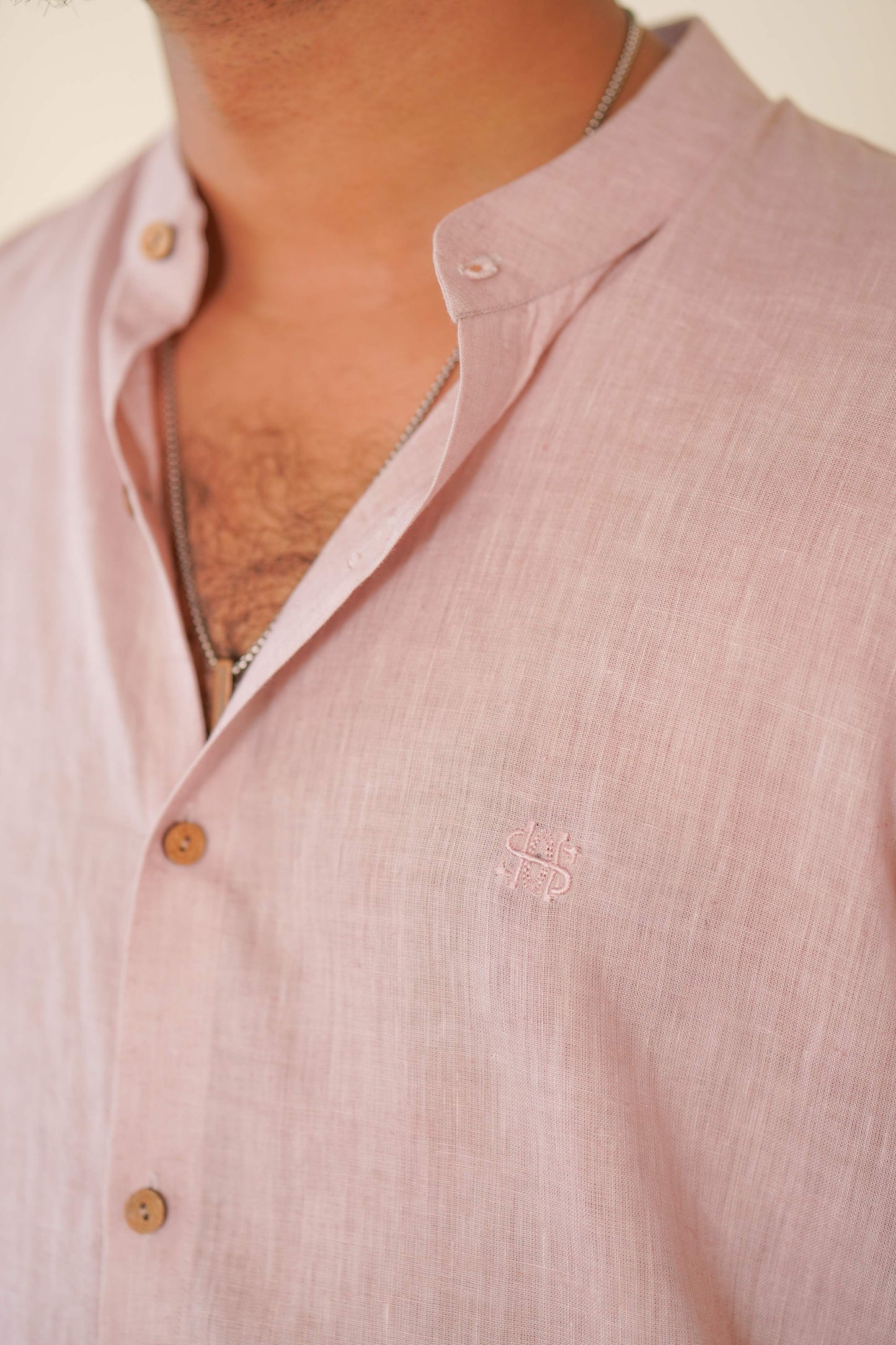 HOS Pure Linen Mens Beige Pink Shirt Close up of HOS Logo