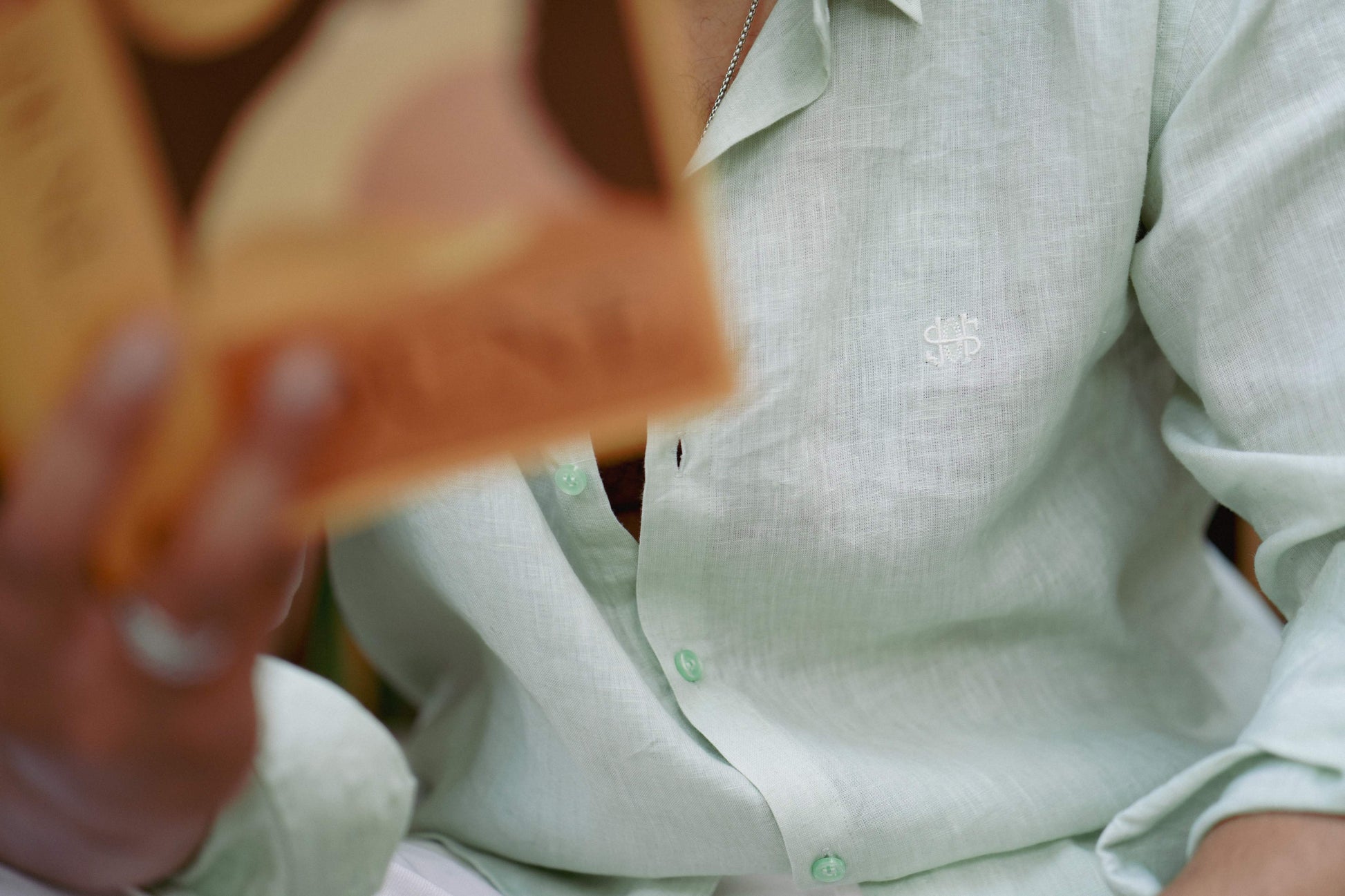 HOS Signature Pure Linen Green Shirt Front HOS Logo Close up